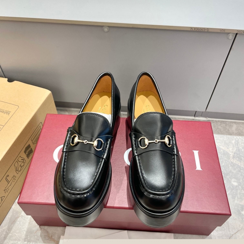 G*u*i leather shoes